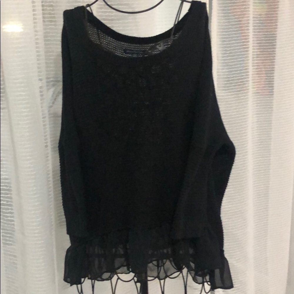 Black sweater with ruffle front and back detail